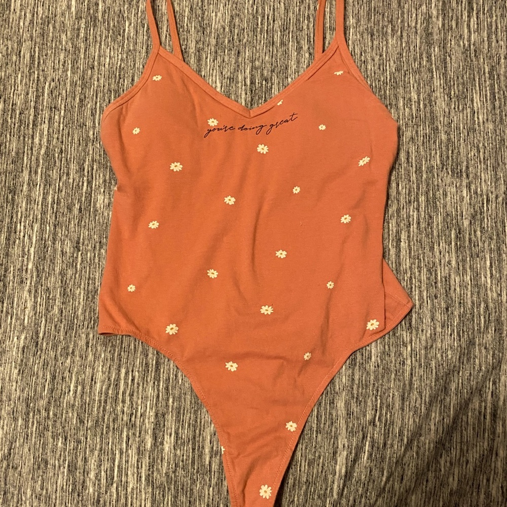 Pink body suit